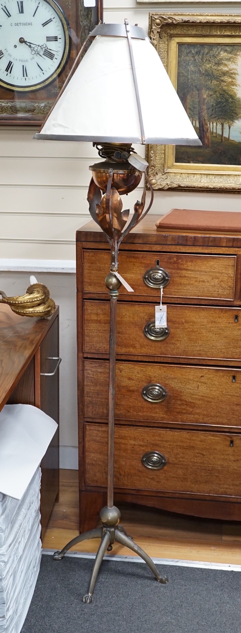 A 1920's brass and copper oil lamp standard converted to electricity, height overall 161cm *Please note the sale commences at 9am.